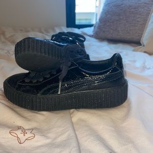 Black platform puma shoes